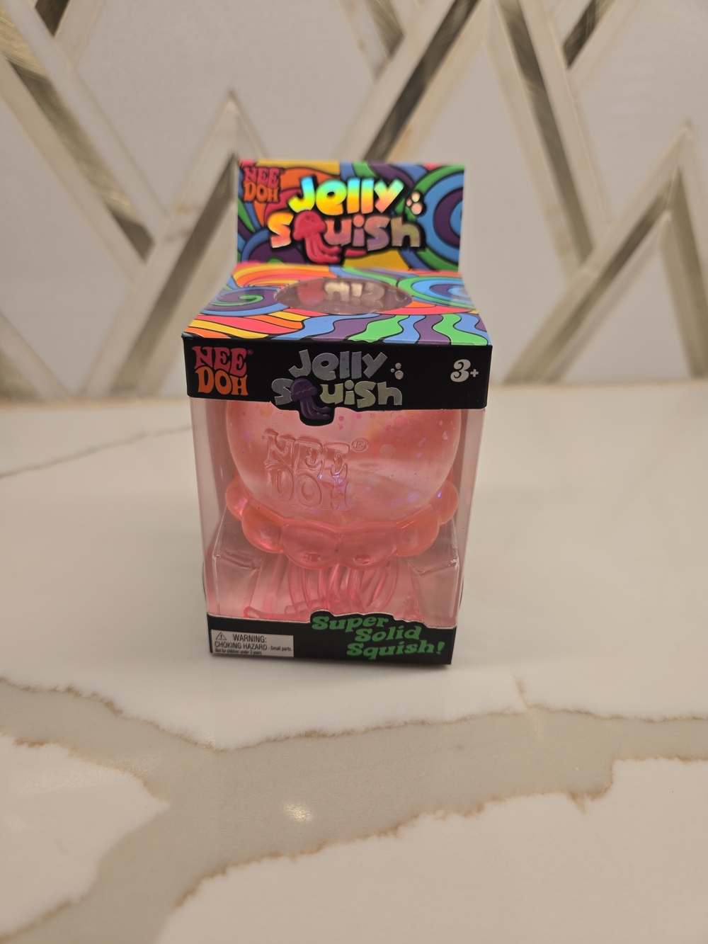 Nee Doh Jelly Squish Pink Super Solid Squish Toy by NeeDoh